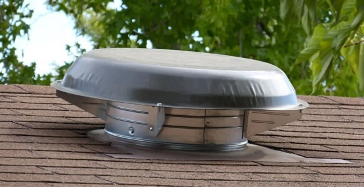 attic fan installation services with low-profile roof ventilation unit in Salt Lake City, UT