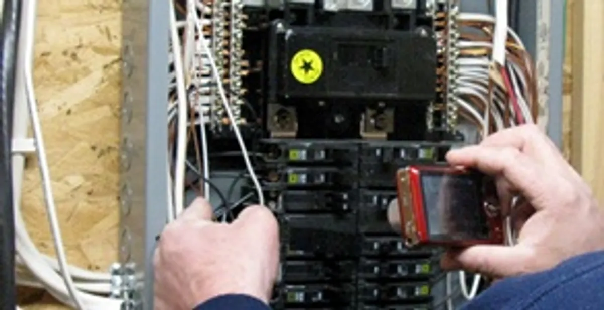 Home electrical inspection of circuit breaker panel by licensed electrician in Salt Lake City, UT